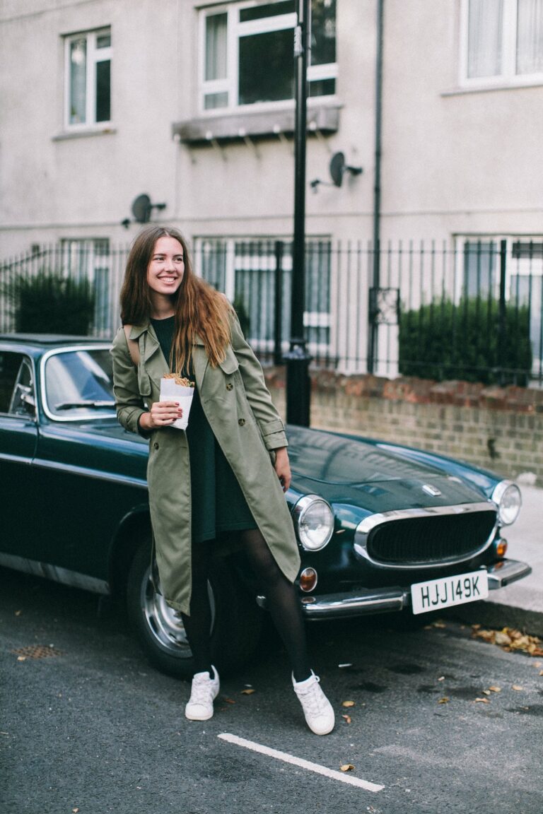 Woman Standing Beside Classic Car